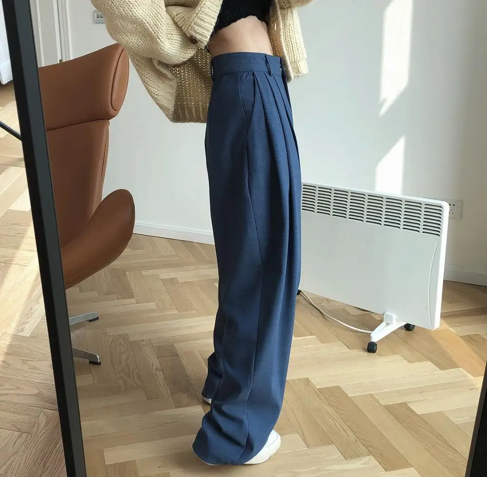 woman classic long trousers black and jeans colors