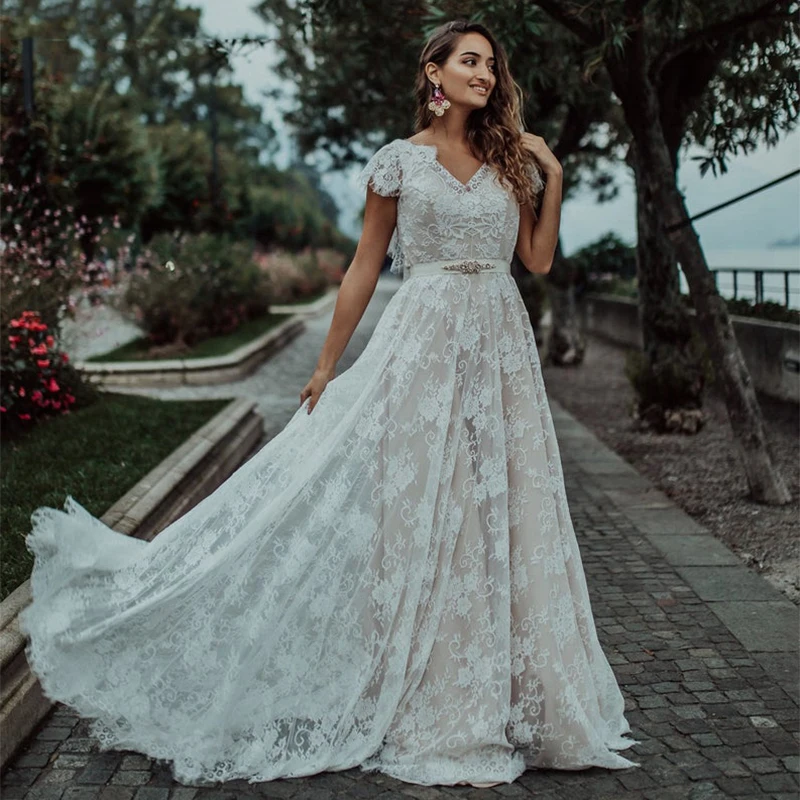 Vestido De novia De encaje De estilo bohemio, prenda De vestir De princesa con la espalda al aire, Mangas De casquillo, color champán, para playa