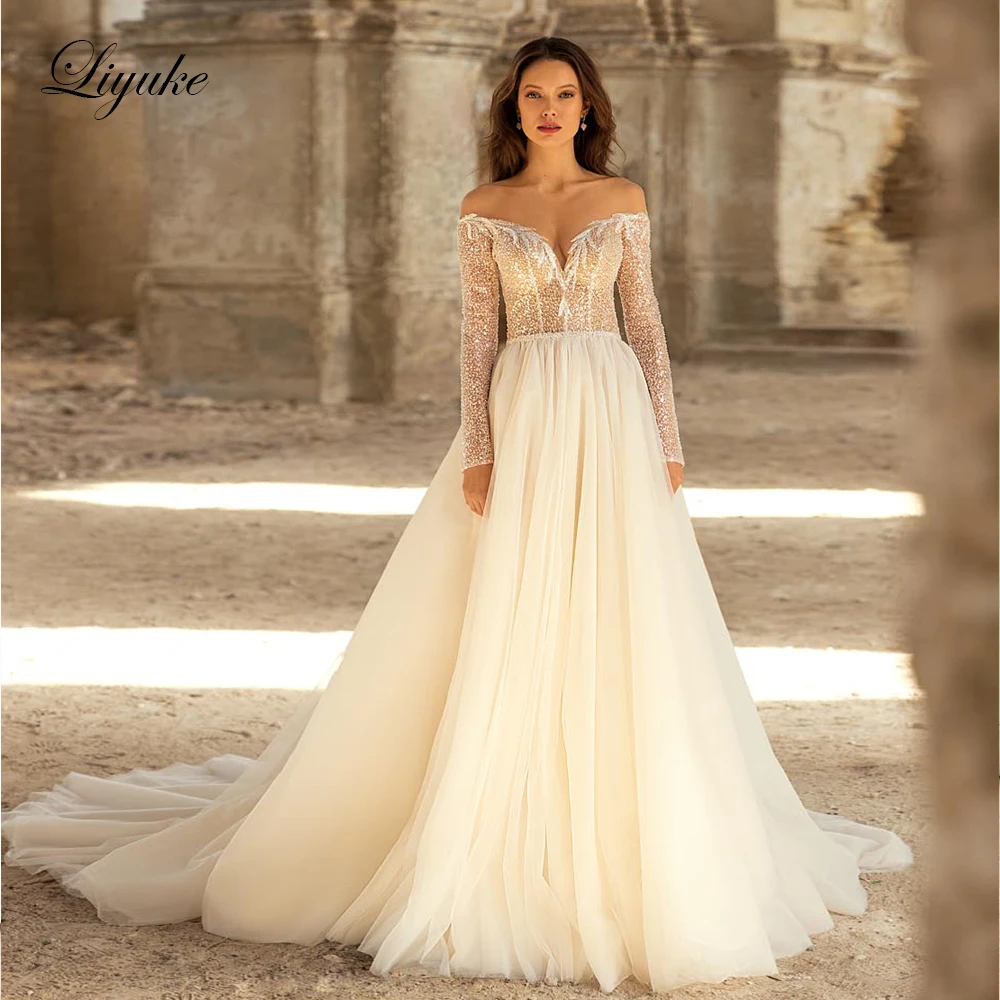 

Liyuke Sparkle Sequins Lace Light Chamapgne Color Of A Line Wedding Dresses With Off The Shoulder Sleeve