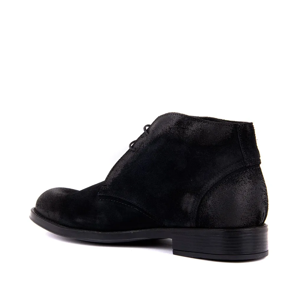 Botas de couro de camurça