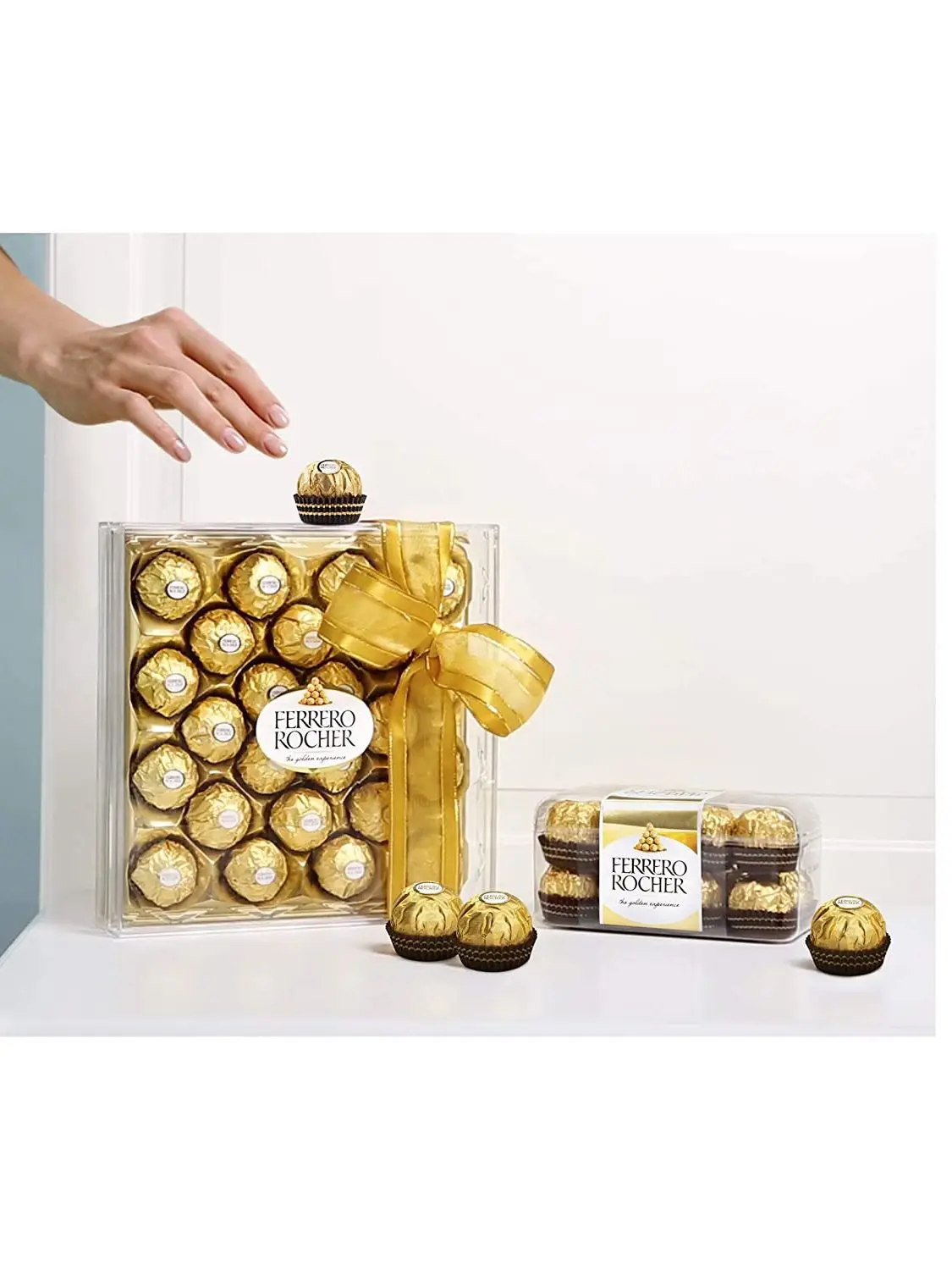 Chocolates ferrero rocher-chocolates de chocolate com leite e avelãs ferrero rocher-um presente para