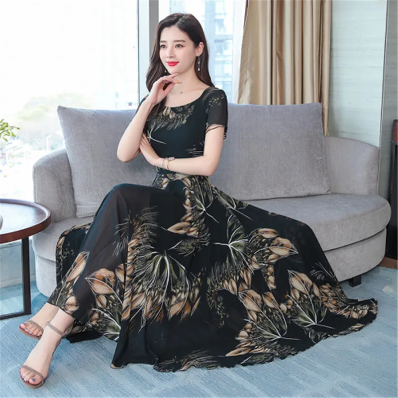 

Chiffon floral dress summer new Korean version of the O-neck short-sleeved long section waist was thin and big swing dress