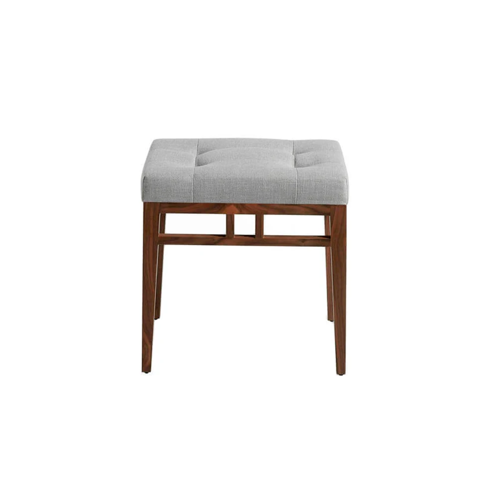 5027 banquette Angel Cerdá-barefoot banquette with upholstered seat and walnut-plated wood structure.