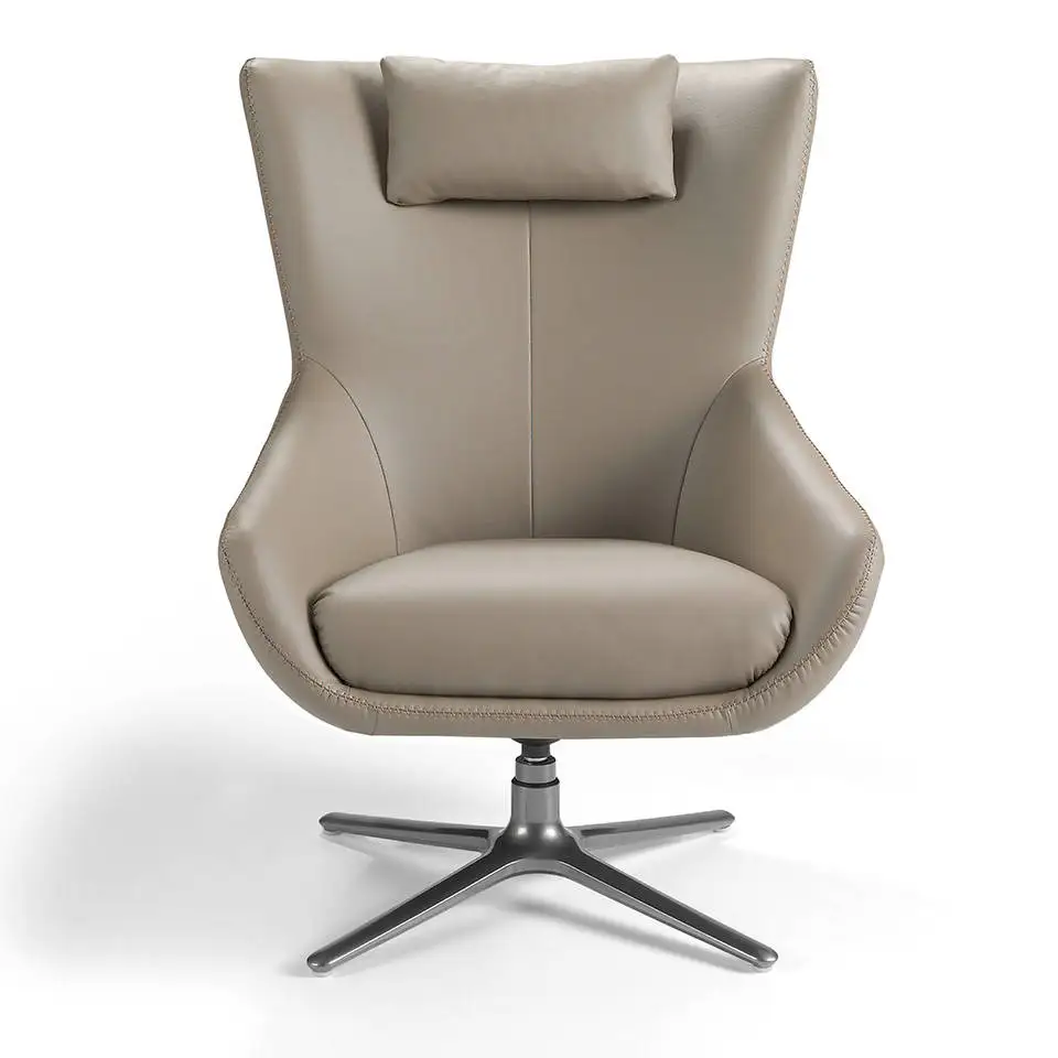 Silon 5044 Angel Cerdá-rotating armchair and headrest cushion upholstered in leather with legs in darkened polished stainless steel.