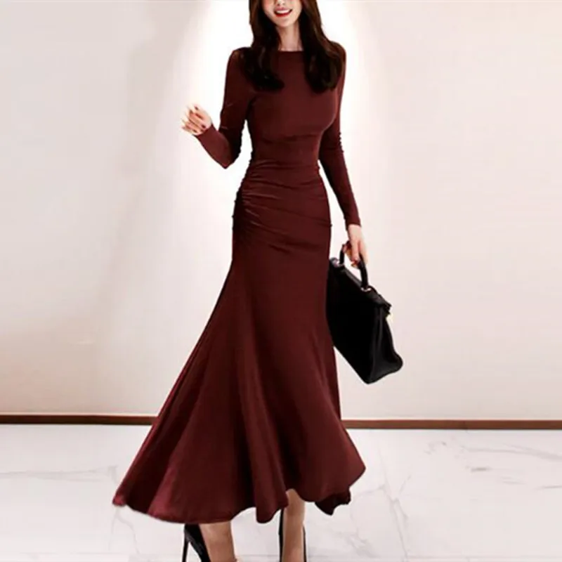 

2019 autumn and winter new Korean version of the O-neck fashion waist pleated temperament goddess fan fishtail dress long dress